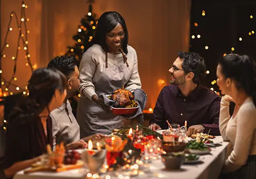 Group of people eating a healthy meal during the holidays.