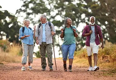 Group Of Active Senior Friends Enjoying Hiking
