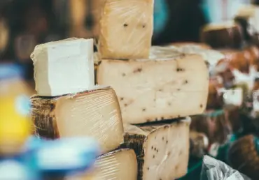 A photograph of cheese stacked onto of each other to help support that cheese can help with heart disease.