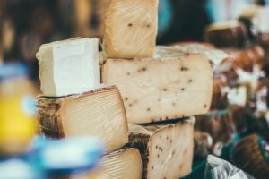 A photograph of cheese stacked onto of each other to help support that cheese can help with heart disease.
