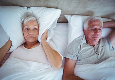 Snoring may be a sign of obstructive sleep apnea.