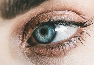 Having pink, red, yellow, blue, or spotty sclerae could be a sign of an underlying condition. Photo by Lisa on Pexels.