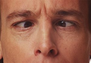 Man cross eyed in the camera.