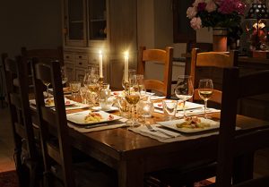 Thanksgiving dishes are set at the table.