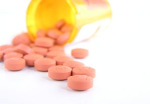 Prescription Bottle of Pills spilled out