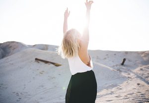 In the desert, a grateful woman gives thanks.