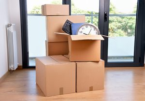 Boxes ready for a move to downsizing