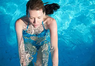 Woman in water, swimming