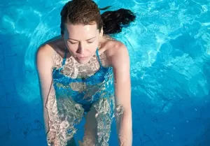 Woman in water, swimming