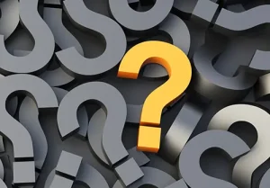 Yellow question mark surrounded by gray question marks