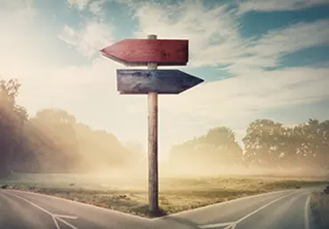 Two paths diverging with post and arrows pointing each way