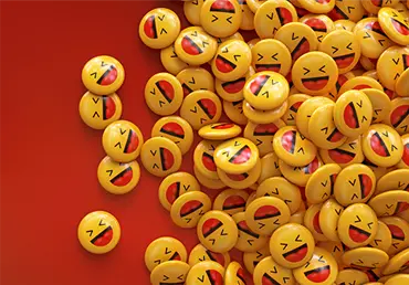 3d rendering of a bunch of yellow laughing emojis glossy pins over red background