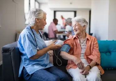 elderly woman visiting doctor blood pressure thumbnail image